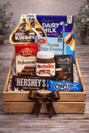 Filipino and international sweets gift crate with Polvoron, Nutella, Lindt, Hershey's, Cadbury, Chips Ahoy and assorted treats