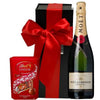 Moët & Chandon Champagne and Lindor chocolate luxury gift hamper with red ribbon