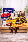 Ultimate chocolate and snack gift crate with assorted chocolates, Ferrero Rocher, Toblerone, Kisses and savory snacks.